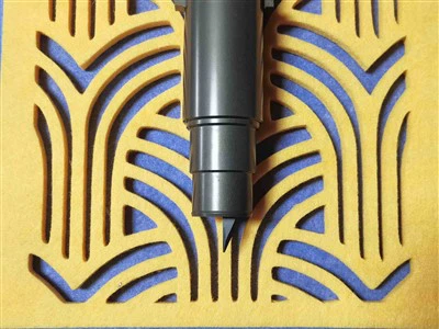 Äänieristyspaneelin leikkauskone